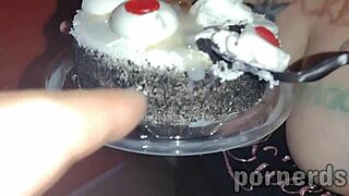 Scarlett slurps 11 cum loads off her birthday cake at arcade