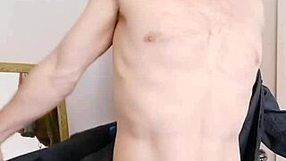 english bull strips shirt jeans revealing muscular body close up