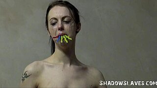 emily's bound prisoner burns in cellblock tits bondage