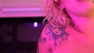A busty blonde pornstar sneaks backstage for a teasing blowjob and handjob on those tattooed feet.