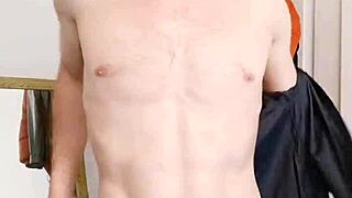 english bull strips shirt jeans revealing muscular body close up