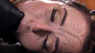 hogtied babe winces as her hairy pussy gets caned hard