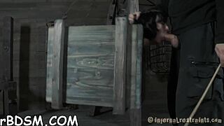 brunette slave in latex dress punished with toys bdsm in garage hardcore