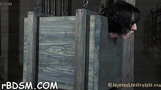 brunette slave in latex dress punished with toys bdsm in garage hardcore