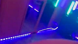 in the dimly lit room, she locks handcuffs for intense bdsm games and submission
