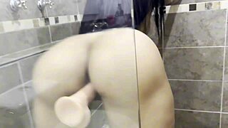 wanna join this latina with huge ass in the shower using her dildo