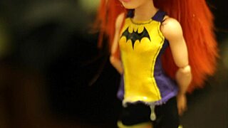 Tied Batgirl Doll Drowns in Sticky Cum Shower