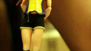 Tied Batgirl Doll Drowns in Sticky Cum Shower