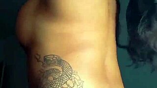 tattooed black prostitute shows off her ass before anal sex and oral cock sucking