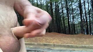 A wild clitlicker flashes her hairy pussy in the forest for voyeur eyes.