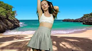 Skinny teen in miniskirt dances on beach no panties WAITING for wind to blow upskirt