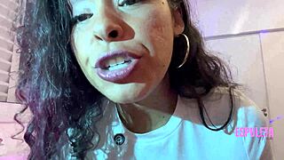 A petite Latina in lingerie flashes her small tits and tiny waist for softcore fun