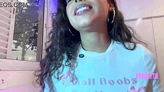 A petite Latina in lingerie flashes her small tits and tiny waist for softcore fun