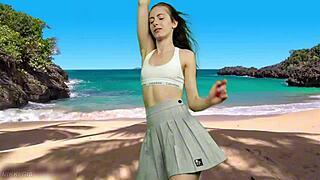 Skinny teen in miniskirt dances on beach no panties WAITING for wind to blow upskirt
