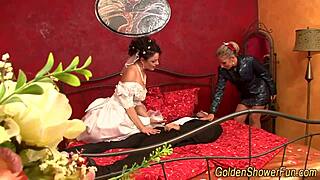 innocent bride kneels for filthy golden shower facial from older guys in group