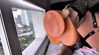 wanna watch this shemale slam her huge ass with dildo in cage?