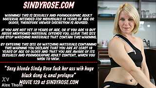 sexy blonde sindy rose stuffs huge black dildo in ass till prolapse