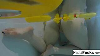 nadia slips into bath playing naughty with rubber duckies