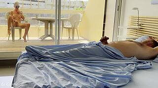 Naked wife watches nudists as husband wakes