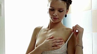 Antoinette Teases With Dildo During Steamy Bath