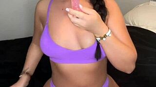 british student plays with toys on webcam