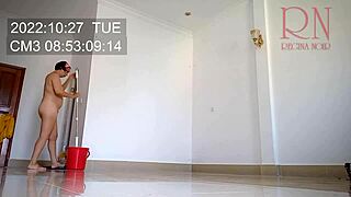 nude maid cleans office space without panties at work
