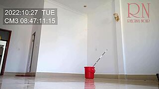 nude maid cleans office space without panties at work