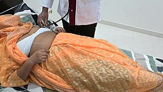 doctor meets lady at hospital for appointment