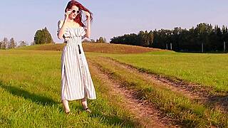 Red-Haired Beauty In The Field