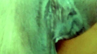 Horny girl plays with her juicy pussy close up
