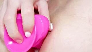 Horny slut stretches her pink pussy and tight ass with toys.